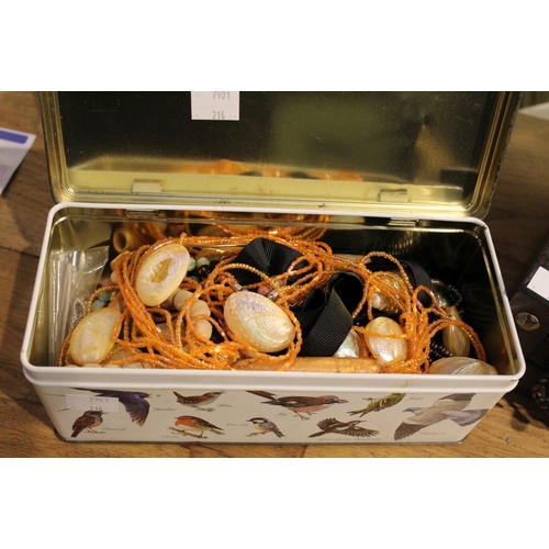 75 - A wooden jewellery box, a bag and a tin containing a good selection of costume jewellery