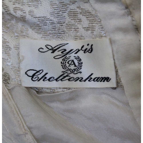 94 - An 'Ayris of Cheltenham' wedding dress with bolero jacket ('Ayris' was bought by Cavendish House lat... 