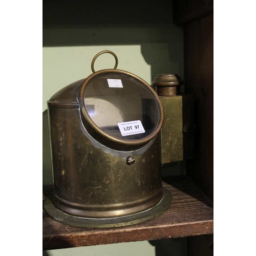 97 - A vintage brass ships compass with side burner to light the instrument