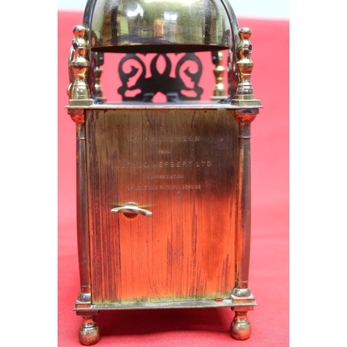 100 - A Smiths brass cased reproduction lantern clock with pierced and engraved decoration, 10.5cm dial wi... 