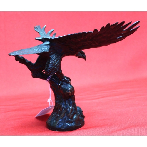 127 - After Archibald Thorburn (1860-1935) bronze Eagle, wings extended, perched upon a tree stump, inscri... 