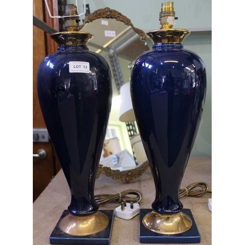 13 - A pair of blue and gilt ceramic lamp bases