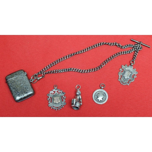 132 - A figurative silver cigar cutter, a silver vesta, watch chain and fobs, combined gross weight 104g