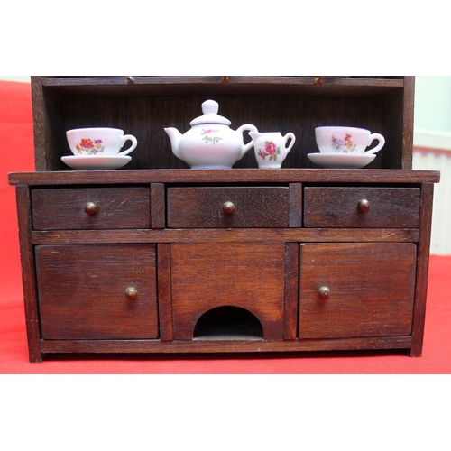 136 - A Dolls miniature stained wood dresser with plate rack back 35cm high, together with a quantity of m... 