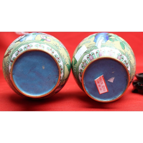 148 - A pair of Chinese Cloisonne vases, baluster form, floral decoration on a yellow ground, 17cm high, w... 