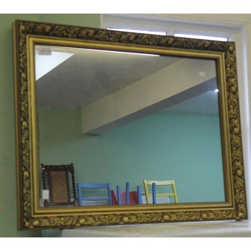 152 - A gilt framed wall mirror, plate size; 60cm x 44cm, with frame; 71cm x 55cm