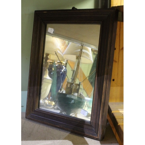 20 - A small Victorian oak framed wall mirror