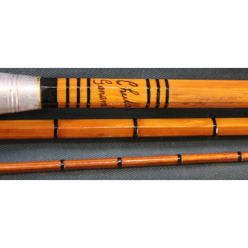 247 - Three piece 10.5 ft cane rod marked 