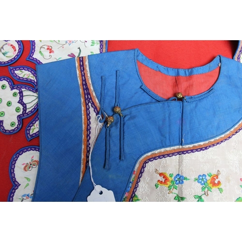 301 - A blue bordered embroidered waistcoat, and separate collar