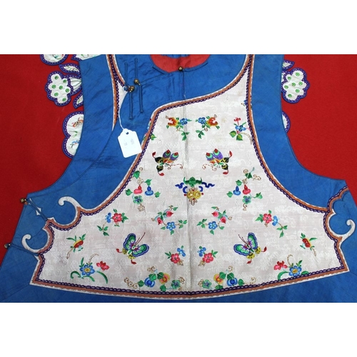 301 - A blue bordered embroidered waistcoat, and separate collar