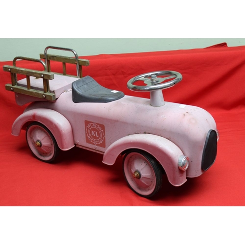 310 - A child's tin ride on/push along fire engine, in need of some restoration