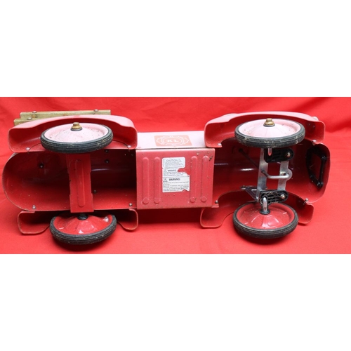 310 - A child's tin ride on/push along fire engine, in need of some restoration