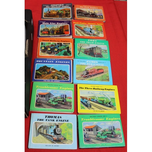 321 - A quantity of books includes childrens annuals, also Rev Awdry Railway books, postcards etc