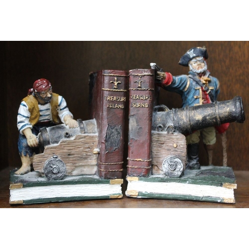 94 - A pair of plaster book-ends 