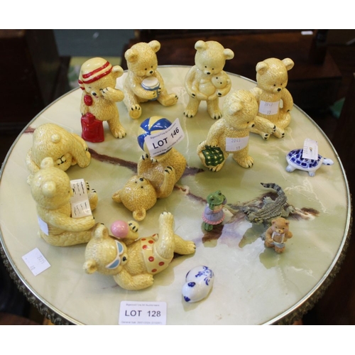 99 - A collection of porcelain comical bears in various poses