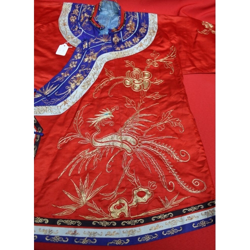 320 - A Chinese embroidered red silk jacket