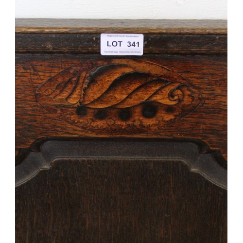 341 - A substantial 19th century oak settle with shell decoration to top panel