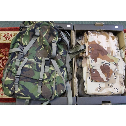 171 - Two boxes of Army surplus - NATO camouflage, combat jackets, trousers, helmet covers, mits, tank ove... 