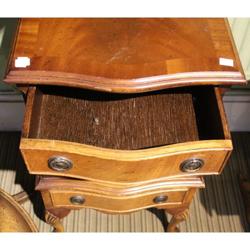 124 - A small reproduction chest of four drawers on legs