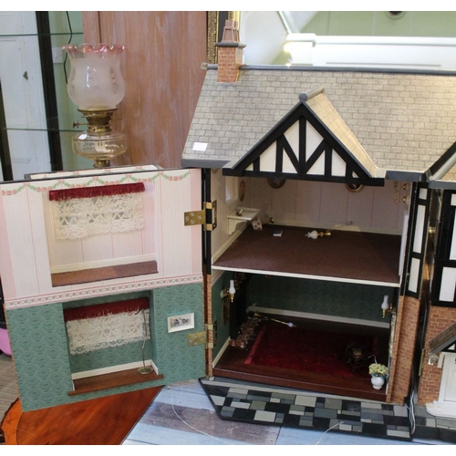 146 - A large well made Dolls House together with an extensive collection of furniture etc (2 boxes)