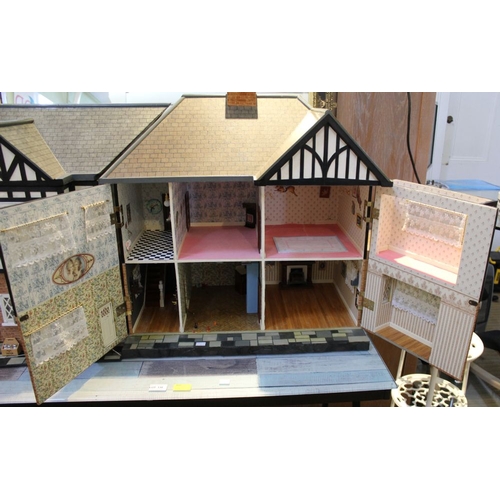 146 - A large well made Dolls House together with an extensive collection of furniture etc (2 boxes)