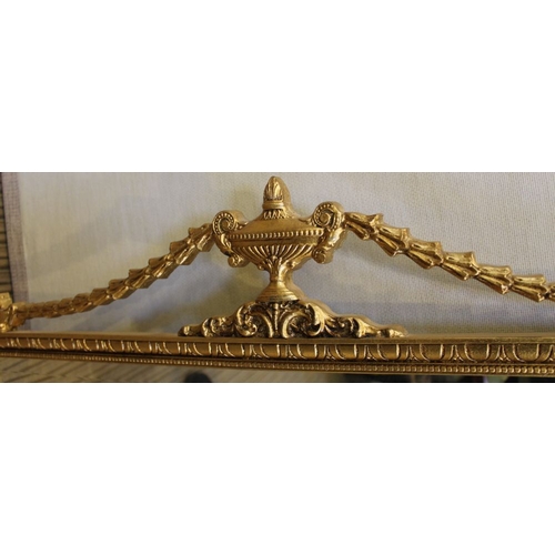 23 - A large modern rectangular bevelled edge wall mirror with fancy gilt frame