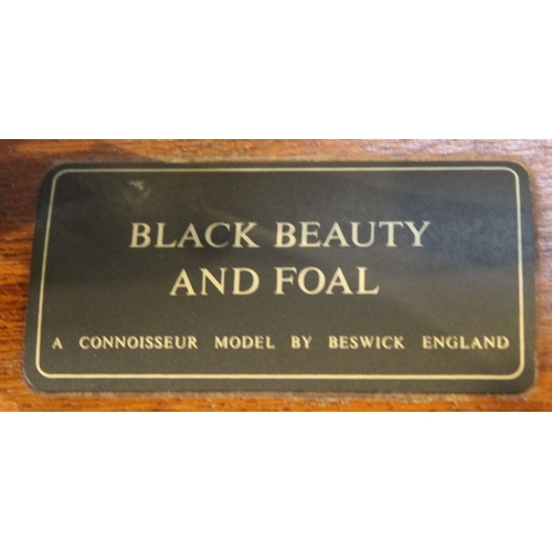 293 - Black Beauty and foal Connoisseur model by Beswick on wooden plinth