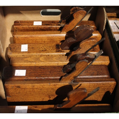 44 - A box containing 8 Victorian wooden moulding planes