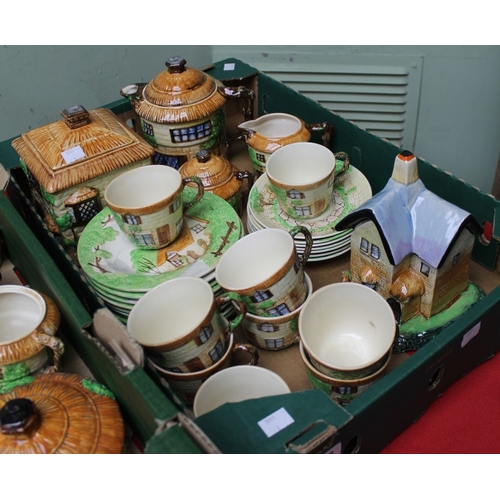 61 - A Beswick cottage ware three piece tea set, cups, saucers and tea plates etc