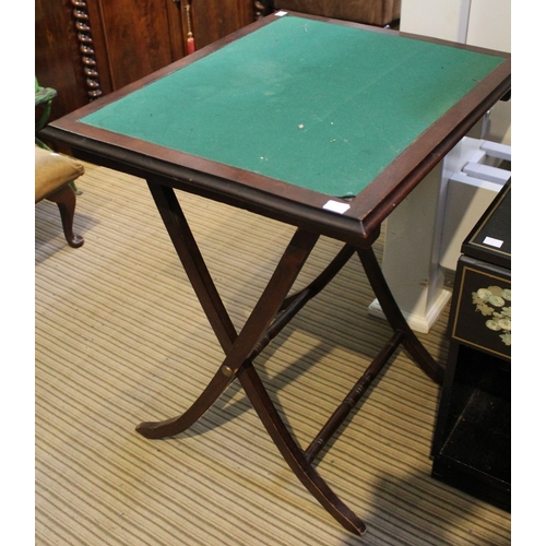 8 - An Edwardian folding occasional table with baize top