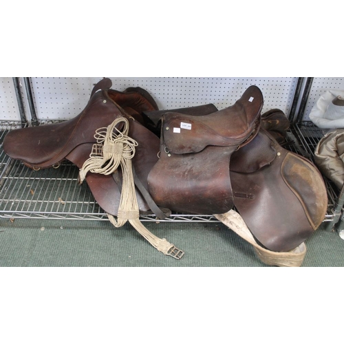 121 - Three vintage leather saddles