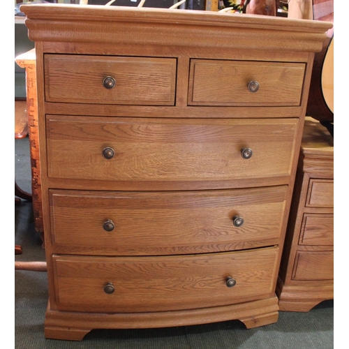 140 - A modern light oak bow fronted chest of two over three drawers, 80cm wide x 100cm high, x 52cm deep ... 