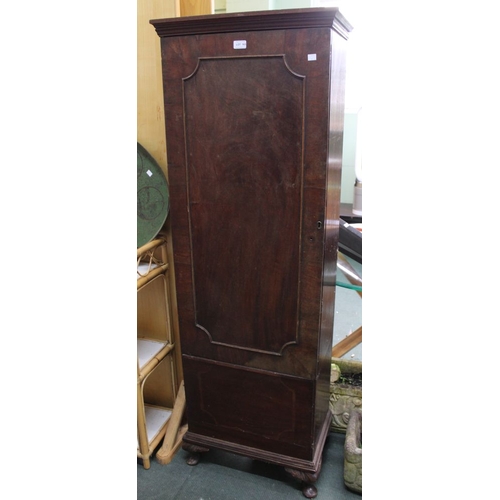 163 - A mahogany slim cupboard shelved internally