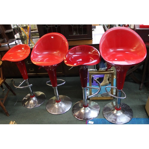 164 - Four red plastic bar stools with chrome stand and adjustable base, one a/f