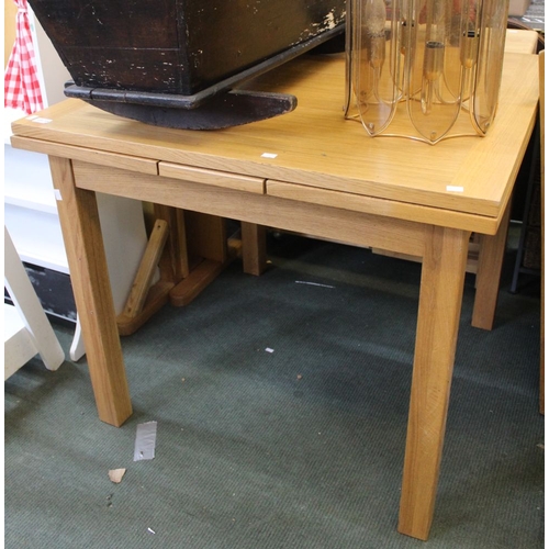 174 - A modern beech draw leaf table