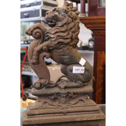 182 - A cast iron doorstop in the form of a lion