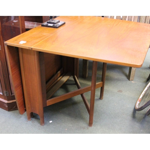 185 - A vintage teak folding gate table by McIntosh