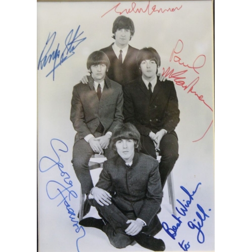 200 - Framed possibly re-print of the Beatles, dedicated to Gill with best wishes and a showtime leaflet