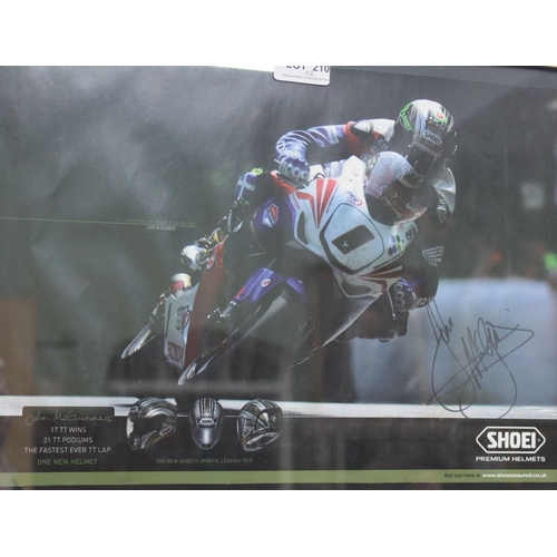 210 - Two framed, signed coloured photos of motor cycle road racing TT winners, John Mc Guinness & Michael... 