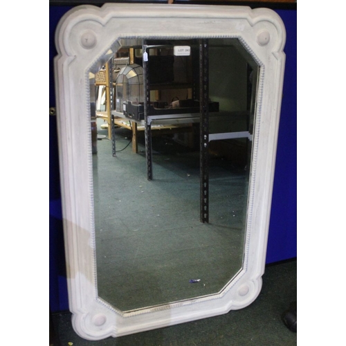 243 - An Art Deco design bevelled edge wall mirror in white painted frame