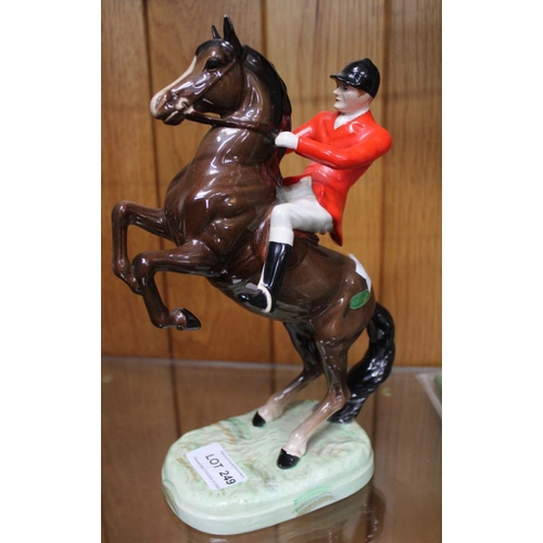 249 - Beswick - A rearing huntsman on brown horse no. 868