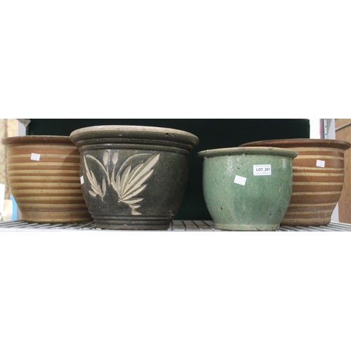 261 - Four glazed terracotta garden pots