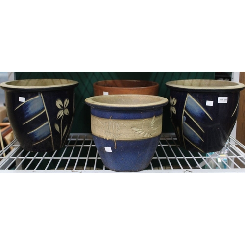 262 - Four garden pots including one terracotta and three blue glazed ceramics