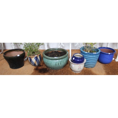 278 - Seven glazed ceramic garden pots various