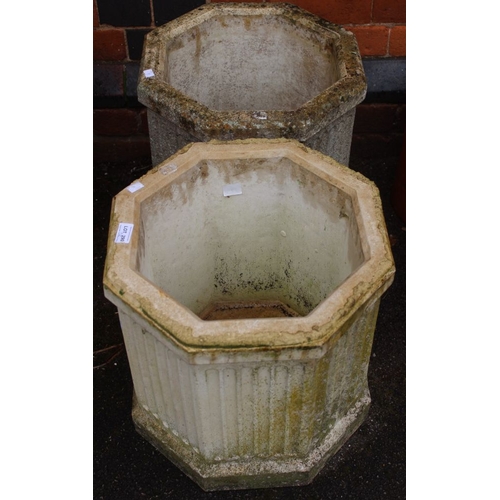 290 - A pair of octagonal cast garden planters