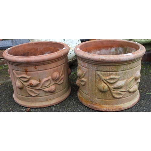 299 - A pair of substantial hand made terracotta circular pots