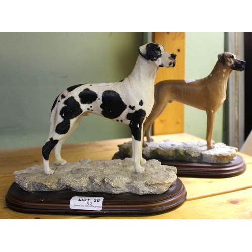 38 - Two Best of Breed ceramic models of Great Danes on wooden plinths by Naturecraft