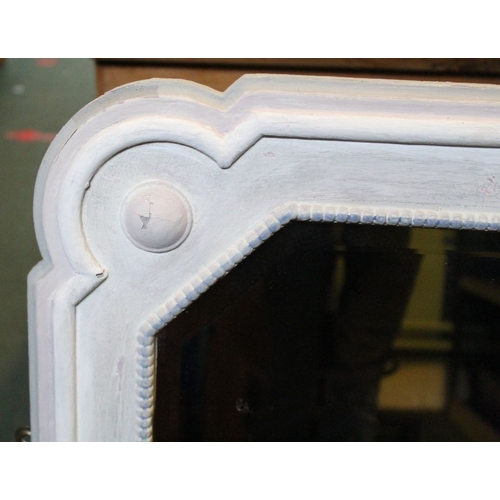 243 - An Art Deco design bevelled edge wall mirror in white painted frame