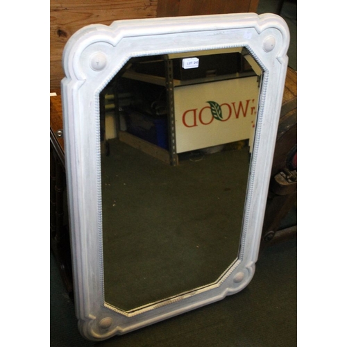 243 - An Art Deco design bevelled edge wall mirror in white painted frame