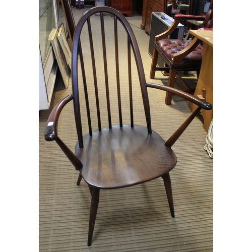 103 - A set of six blue label Ercol dining chairs, including two carvers in dark wood